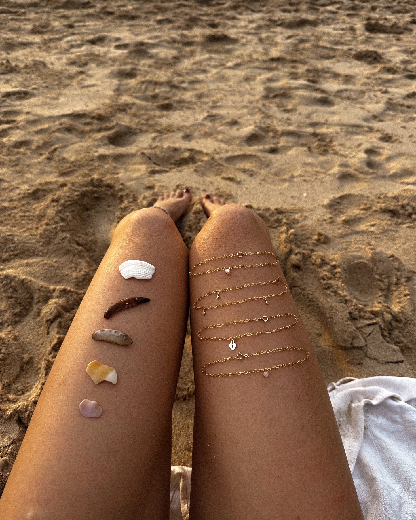 Gold-filled chain anklets by The Littl flat lay